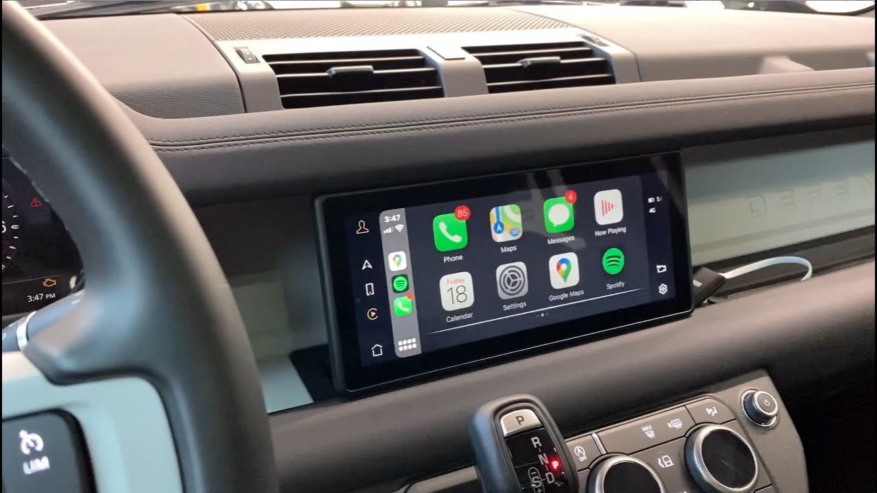 Defender Apple CarPlay on Pivi Pro display showing navigation and music apps